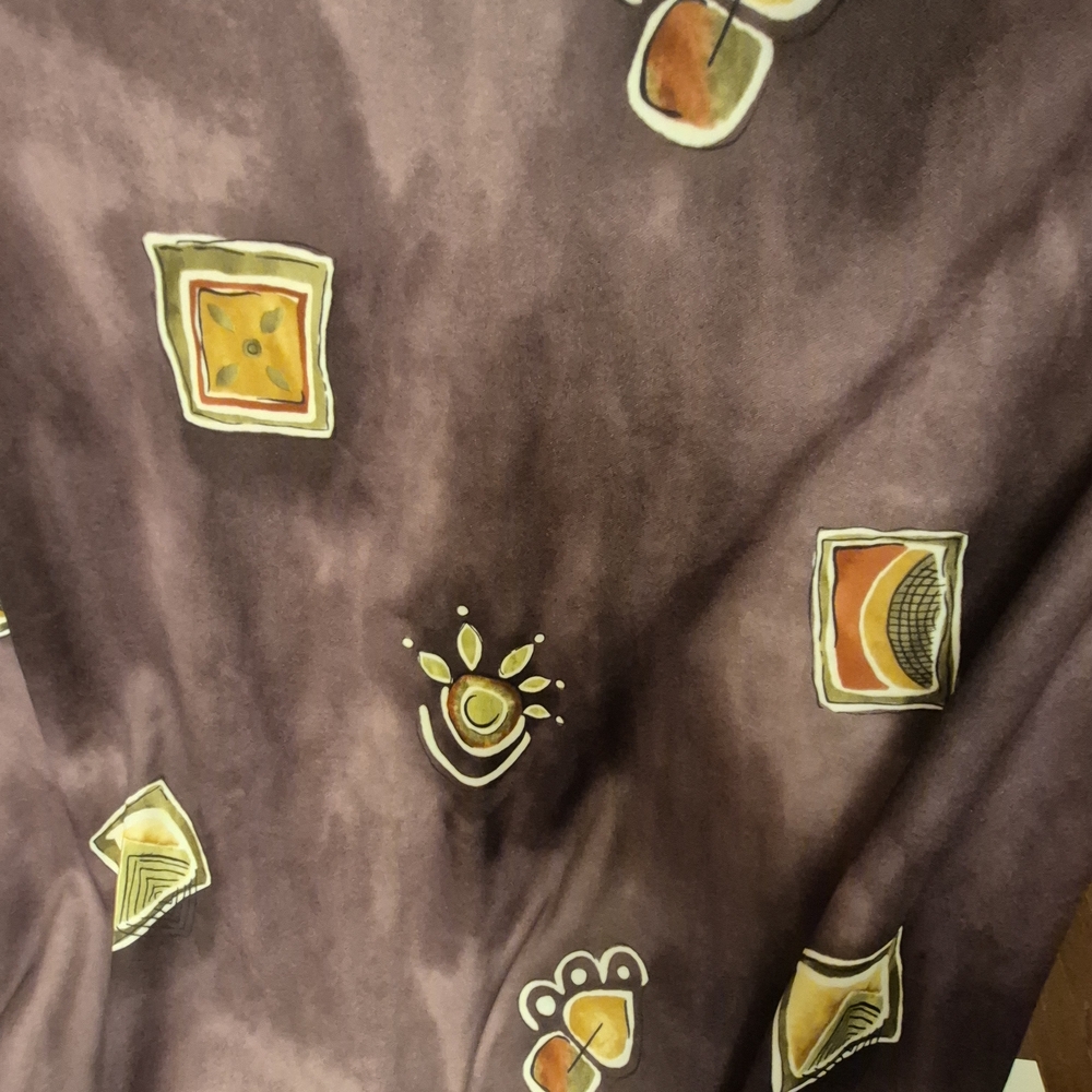 Artistic Purple Fabric with Geometric Accents